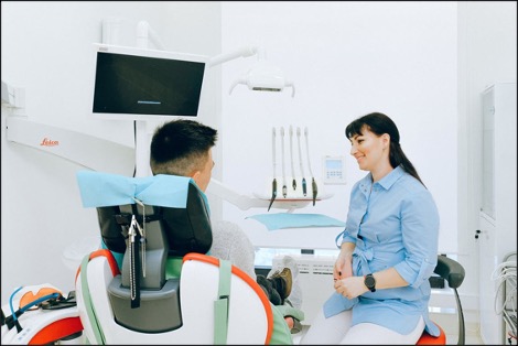 Oral Surgeon and Patient in a Surgical Room